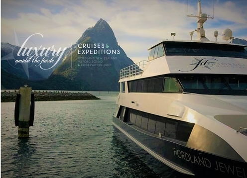Explore Milford Sound aboard our new and luxurious 5-star boat, the Fiordland Jewel, featuring an onboard helipad, on-deck hot-tub, kayaks, zodiak, and superb cuisine. 
Taking only 20 passengers a night, in nine luxury climate-controlled cabins, all with king-sized beds, ensuite bathrooms, and majestic fiord and ocean views, we offer a new and unique luxury boutique-cruising experience.